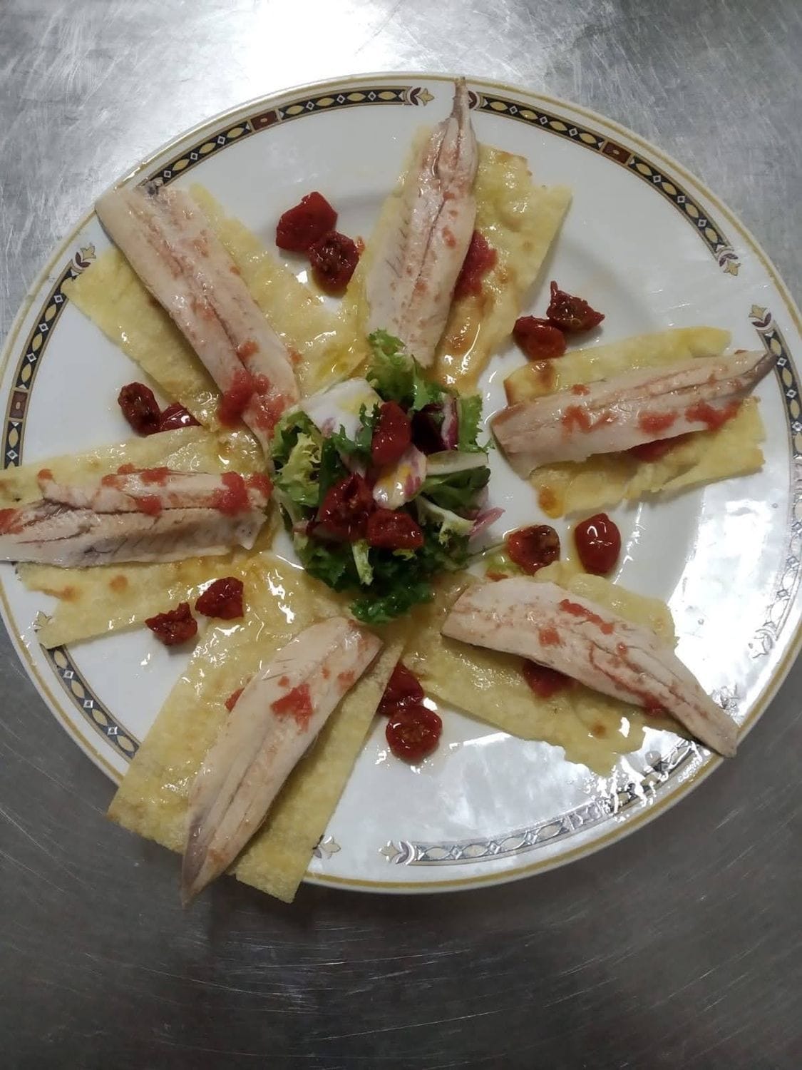 Puerros con su salsa y polvo de nuez